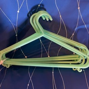 Plastic Children’s Hangers ( White and Green Colors) count of 20.
